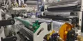 Tandem Coating and Lamination with Centre Winding